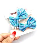 COLITA RESORTE CON MOÑO 2pcs COD.207/208 - Image 2